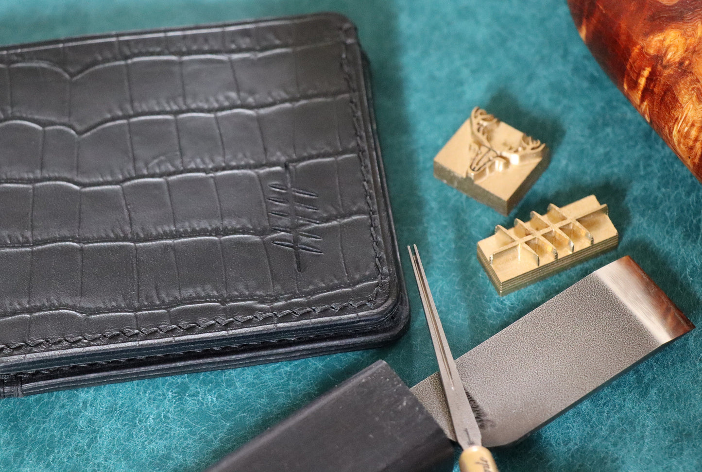 The Elder Bi-fold wallet in Crocodile Embossed Full grain Italian leather.