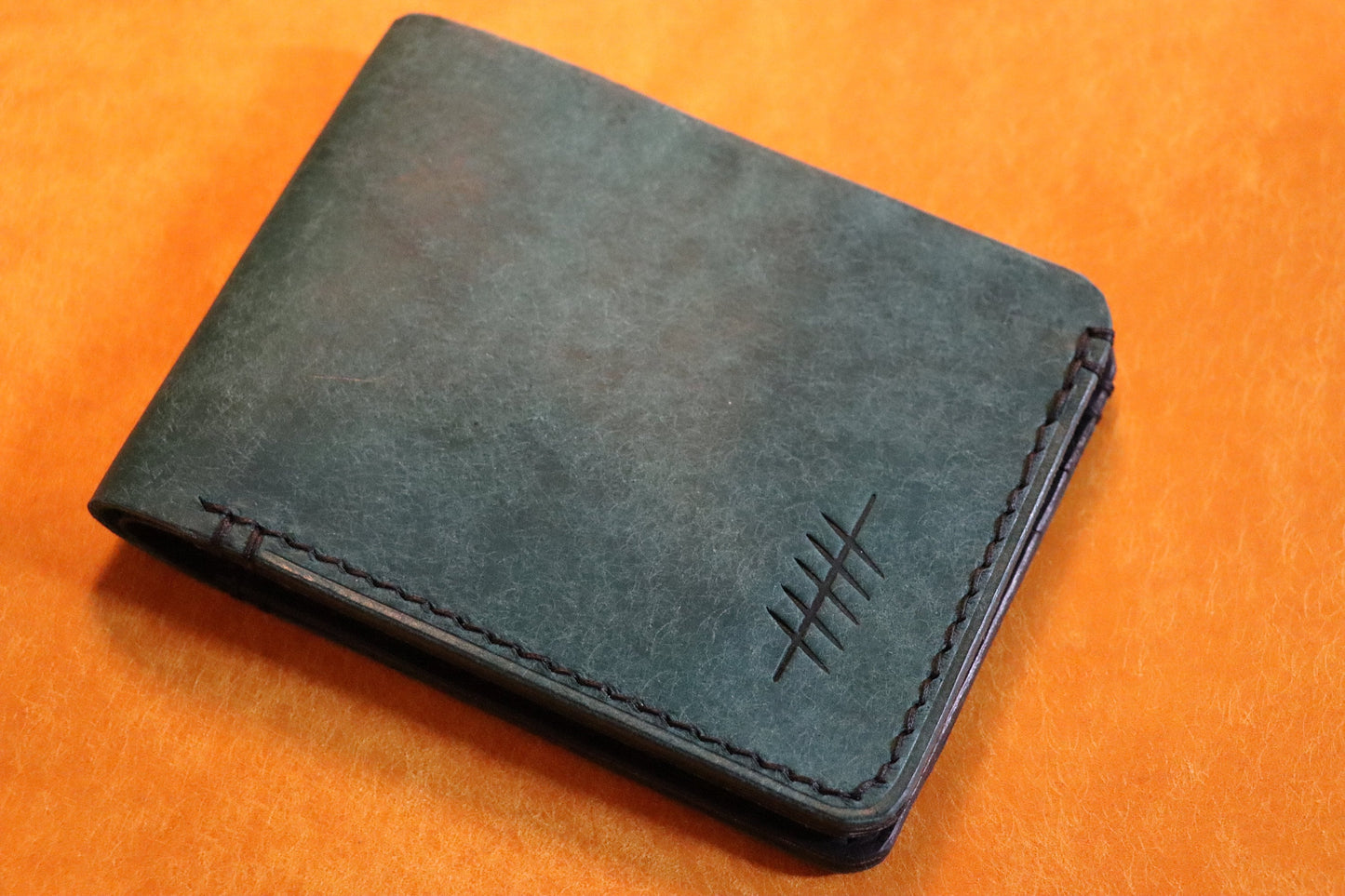 The Elder Bi-fold Wallet In Full Grain Italian Leather